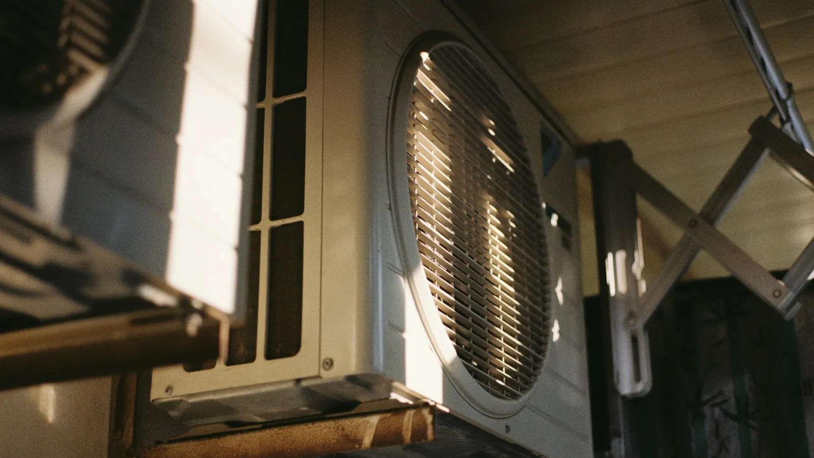 Outdoor mini-split condensing unit with refrigerant line connections that may indicate low refrigerant mini split symptoms